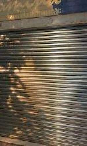 Reparo em portas de enrolar manual em sp Reparo em portas de enrolar manual em sp